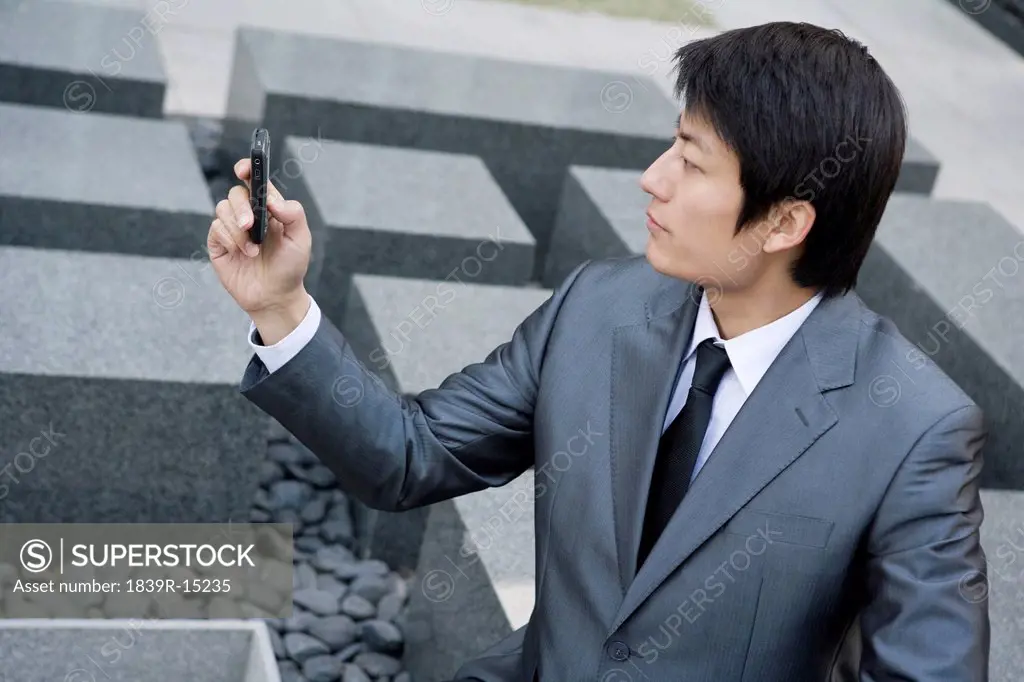 Businessman using cellphone