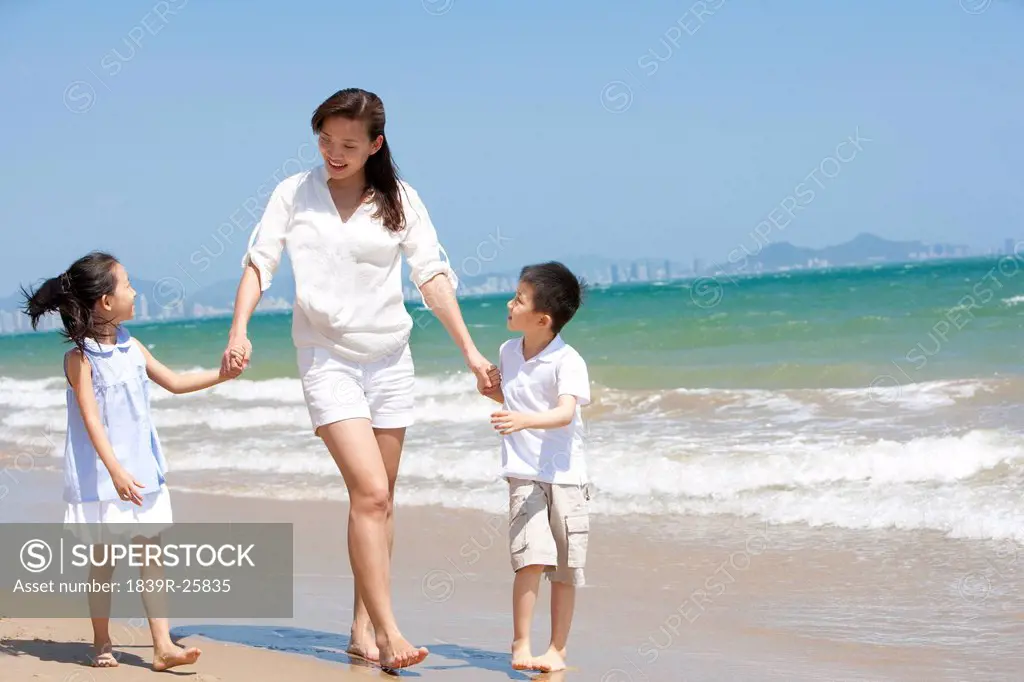 Family Walking on the Beach