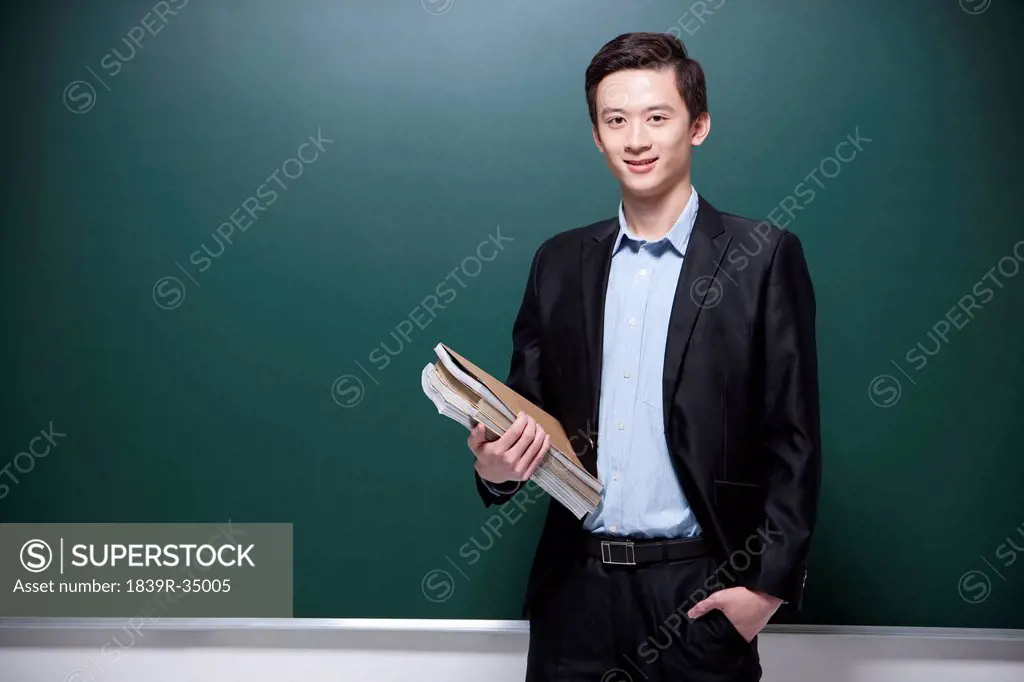 Professional male teacher in classroom