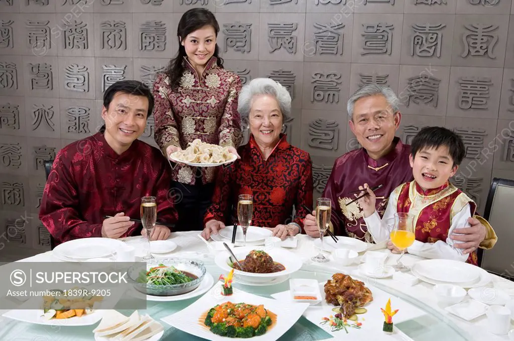 Chinese family celebrating at Chinese restaurant