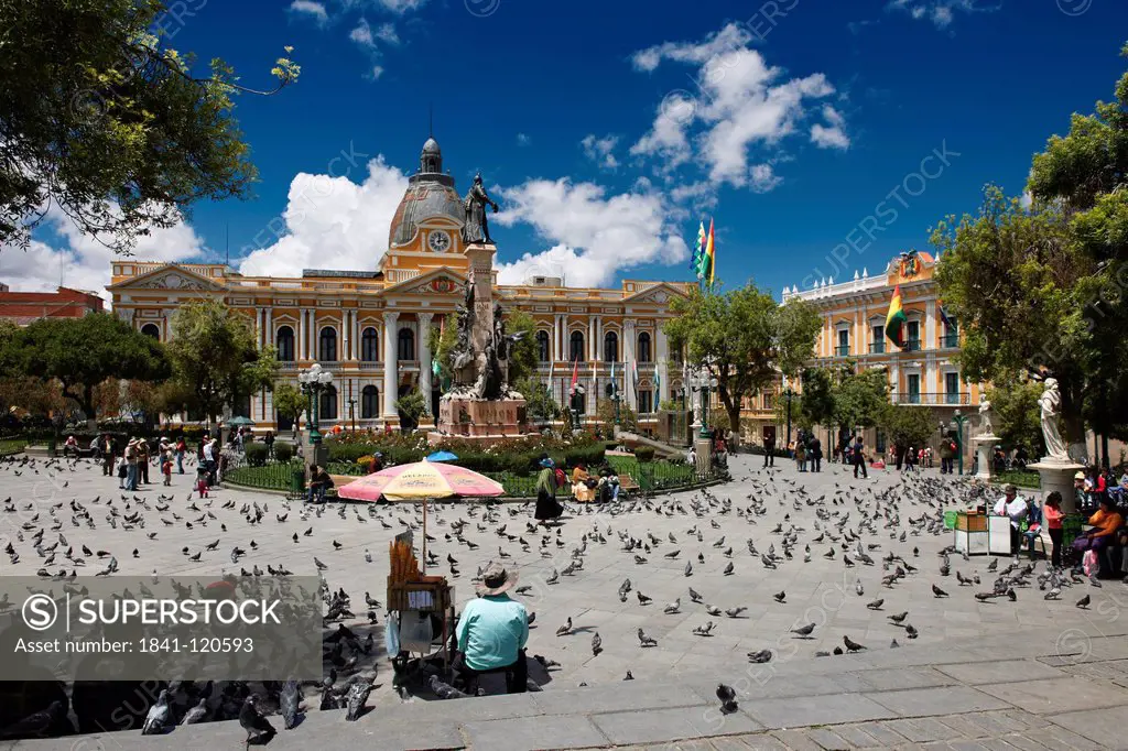 Plaza Murillo with pigeons, statue and Parliament Building, La Paz, Bolivia