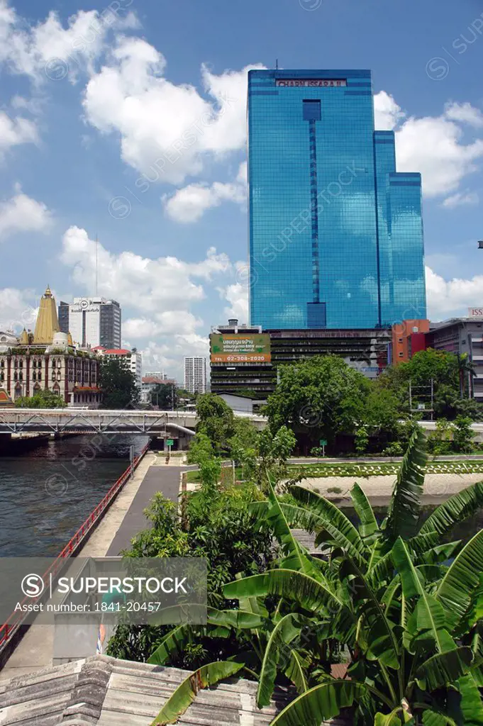 Glass buildings on riverside, Bangkok, Thailand