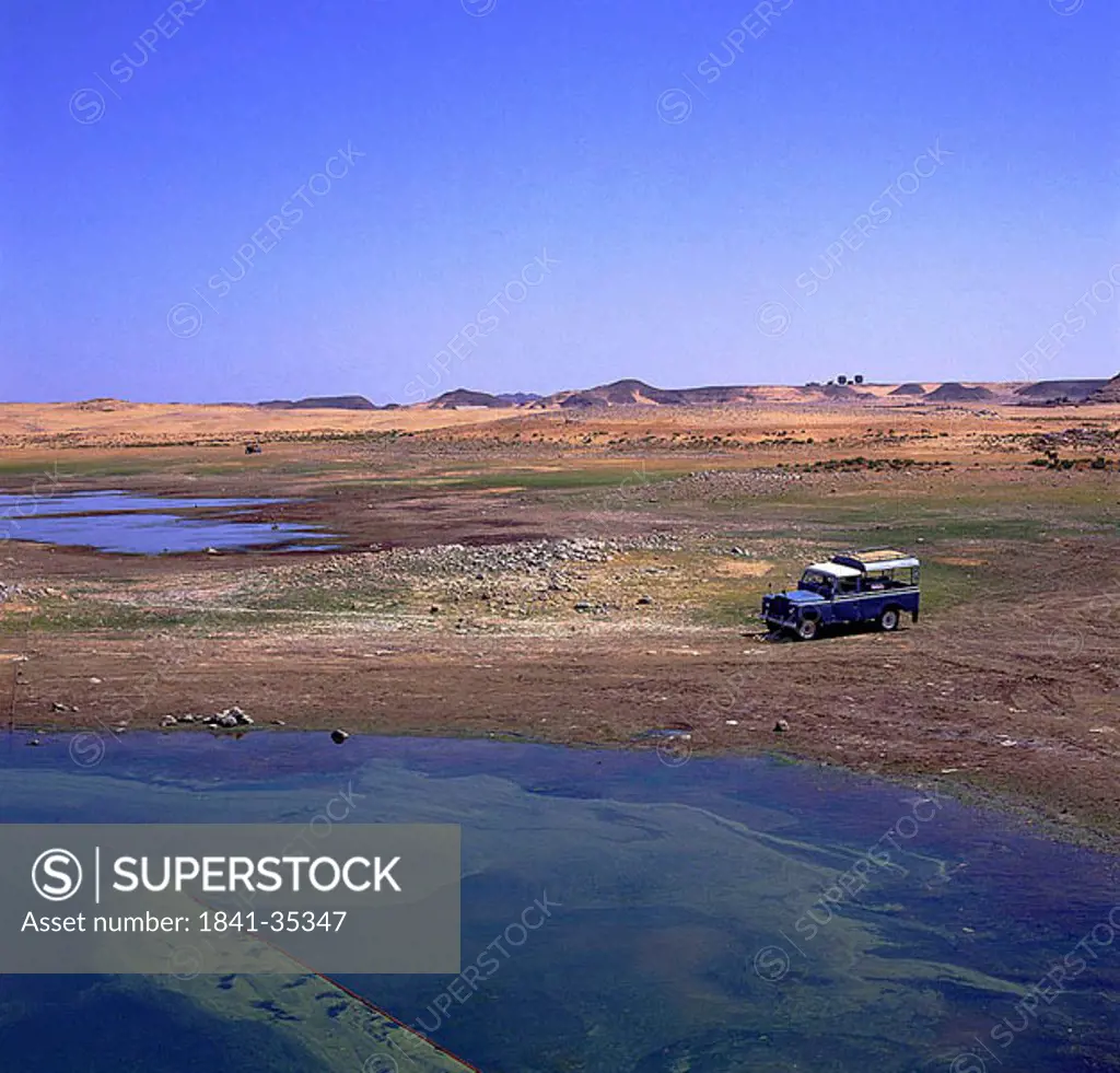 Land vehicle on lakeside, Wadi Halfa, Lake Nubia, Sudan