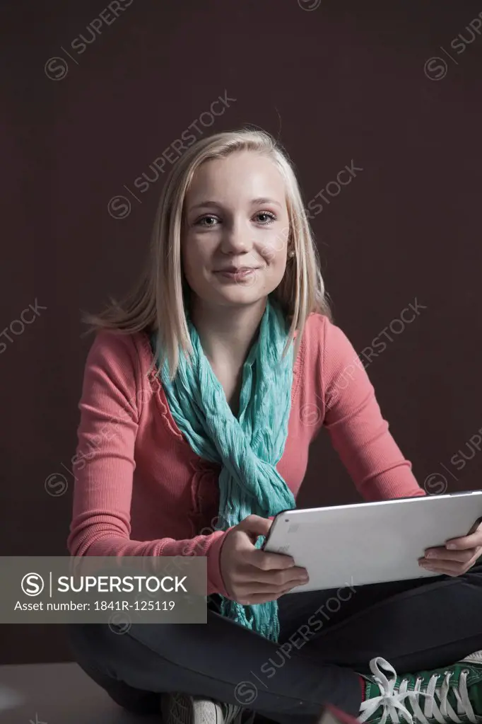 Teenage girl with ipad