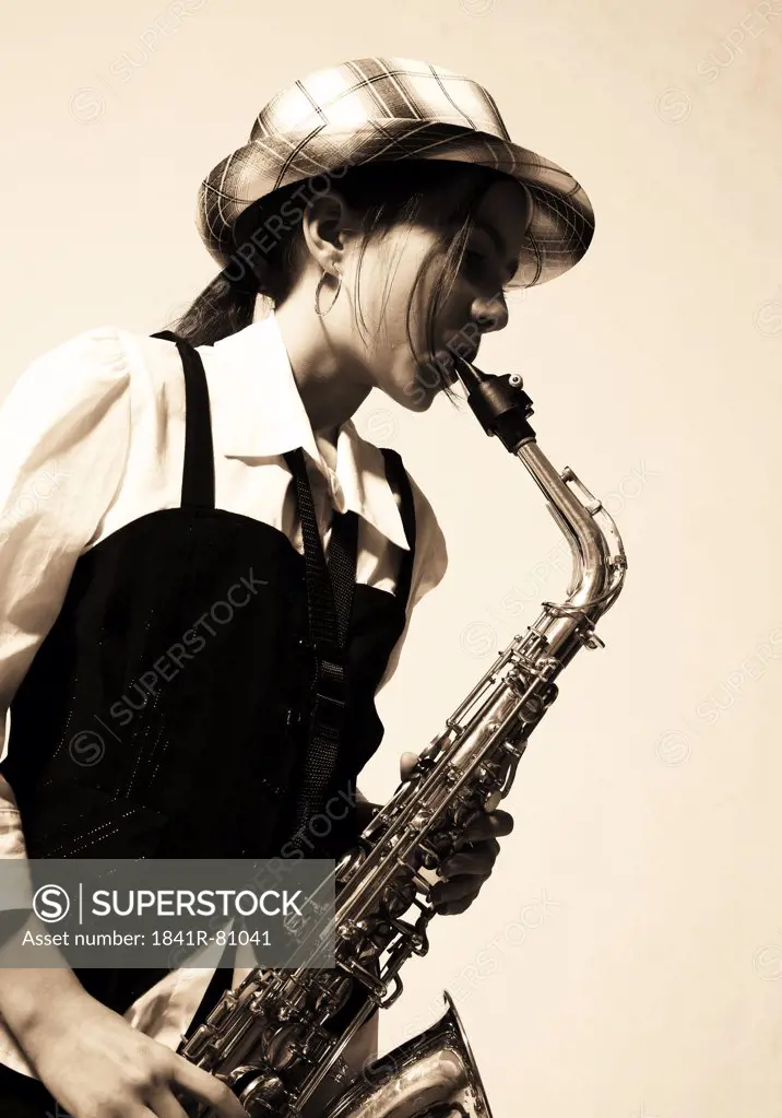 Girl playing saxophone