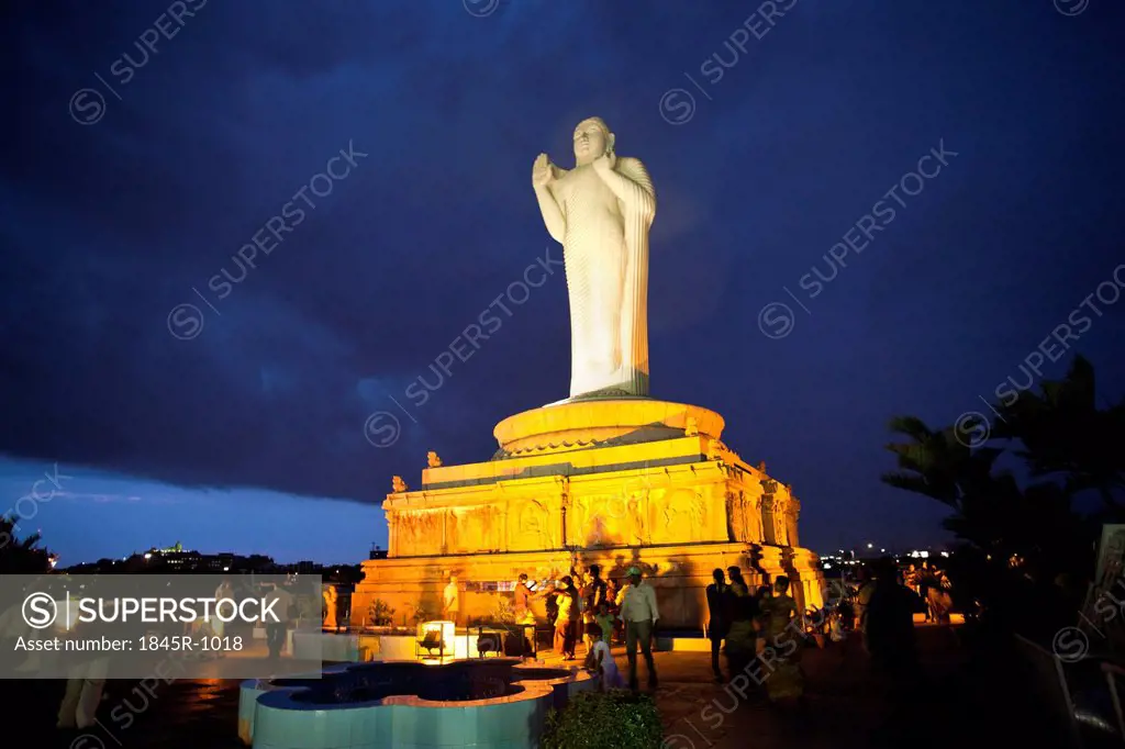 Tourists near a Statue of Buddha, Hussain Sagar, Hyderabad, Andhra Pradesh, India
