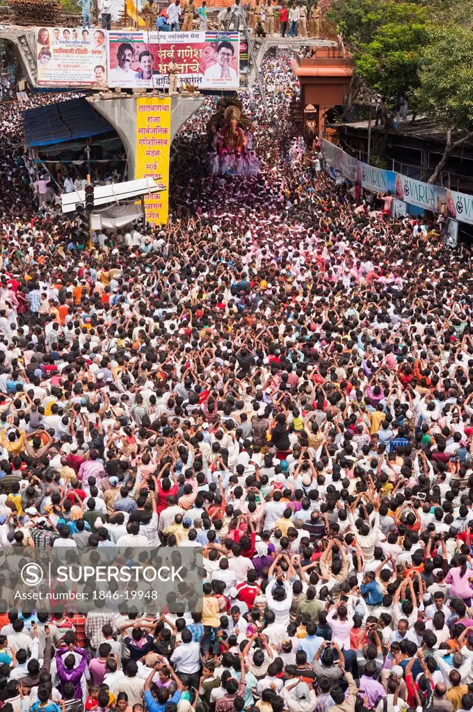 Crowd at religious procession during Ganpati visarjan ceremony, Mumbai, Maharashtra, India