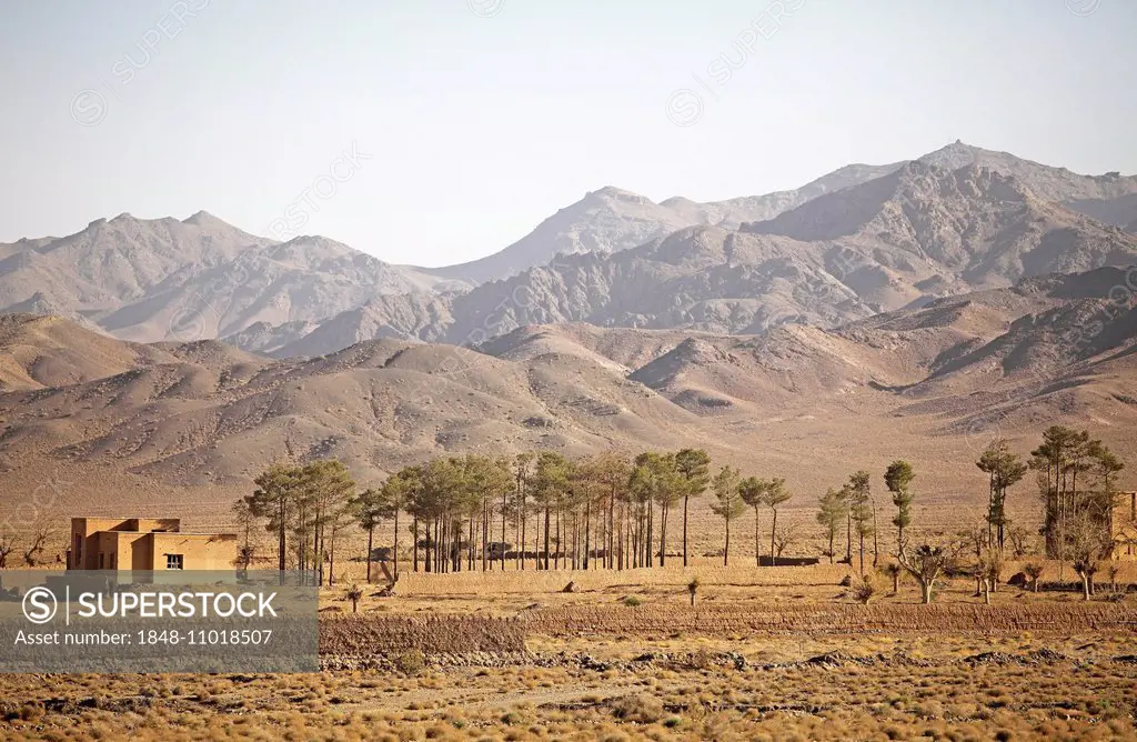 Isolated house and trees in the Kuhrud Mountains, Isfahan province, Persia, Iran