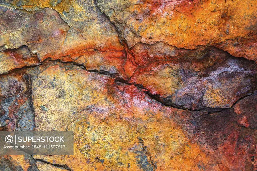 Colourful rust on a ferrous rock, Iceland, Europe