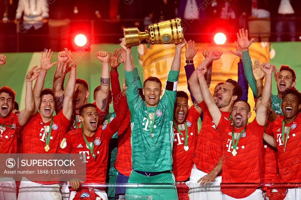 Goalkeeper Manuel Neuer FC Bayern Munich with cup, cheering at FC Bayern Munich after cup victory, 76th DFB cup final, RB Leipzig, RBL, against FC Bay...