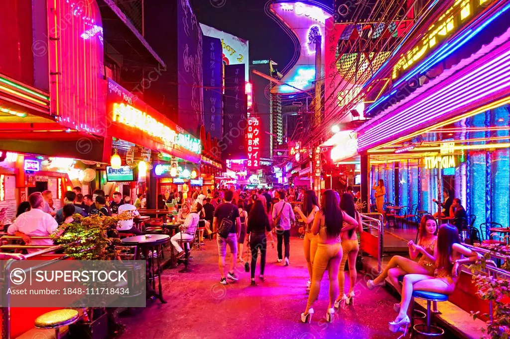 Nightlife, Soi Cowboy Red Light District, girls standing outside bar, Asoke Road, Sukhumvit, Bangkok, Thailand