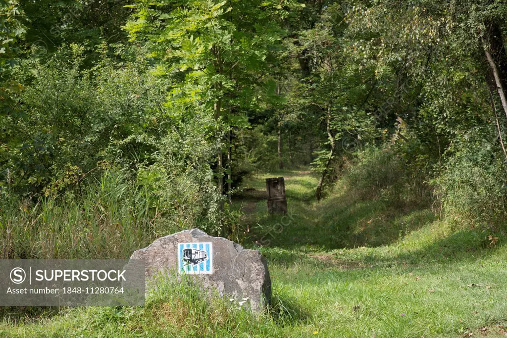 Route of the Buchenwaldbahn tracks, today memorial trail to the Buchenwald concentration camp, with symbol stones, behind historic milestone 5 k, Weim...