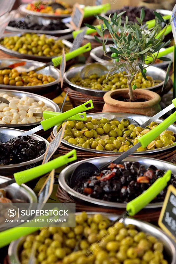 Various types of olives at a market stall, L'Île-Rousse, Balagne, Corsica, France