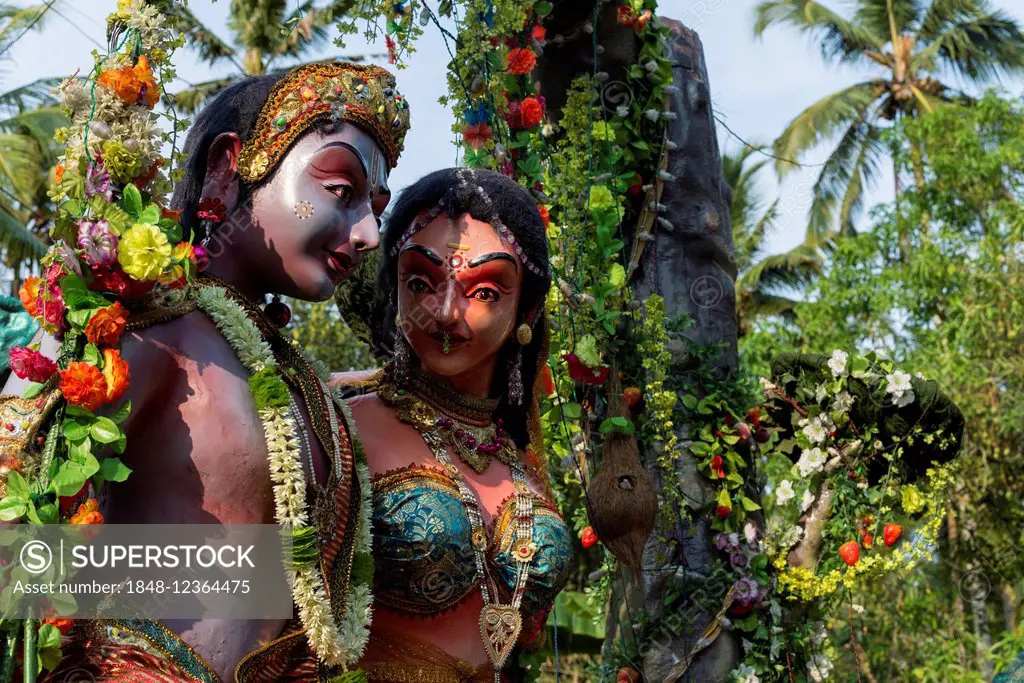 Shiva and Parvati sculptures displayed at a procession during a temple festival, Ayroor, Kerala, India