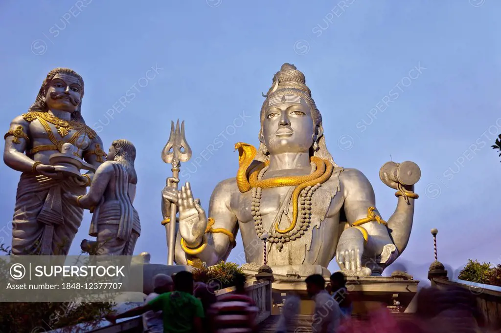 Giant statue of Lord Shiva, Murudeshwar Temple, at dusk, Murudeshwar, Karnataka, India