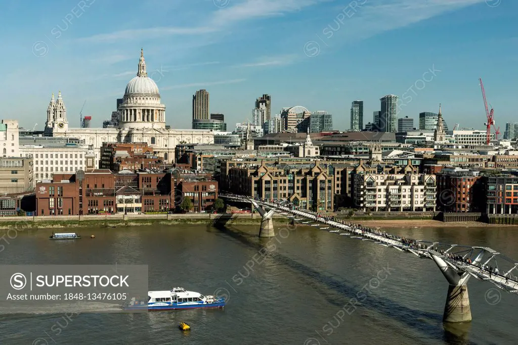 London skyline with St Paul's Cathedral and Millennium Bridge over the River Thames, London, England, United Kingdom