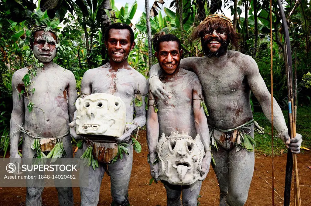 The mud men, also called Mud Man of Asaro with their martial masks of clay, Goroka, in the highlands of Papua New Guinea