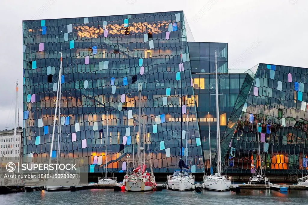 Harpa Concert Hall with marina, dichromatic glass facade with colour effects by Olafur Eliasson, Reykjavik, Iceland