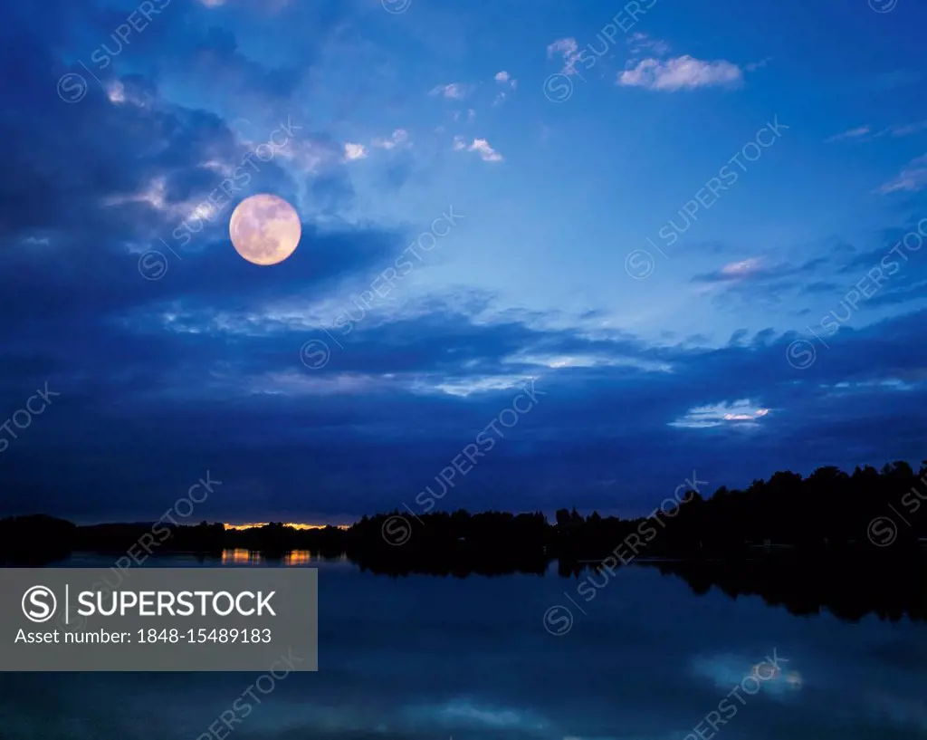 Staffelsee near Murnau Upper Bavaria Germany sunset with moon