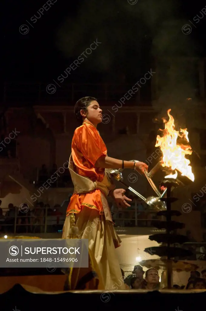 Brahman Hindu priest performing the sunset celebration at the Ganges River, Dashashwamedh Ghat, Varanasi, Benares, Uttar Pradesh, India, South Asia