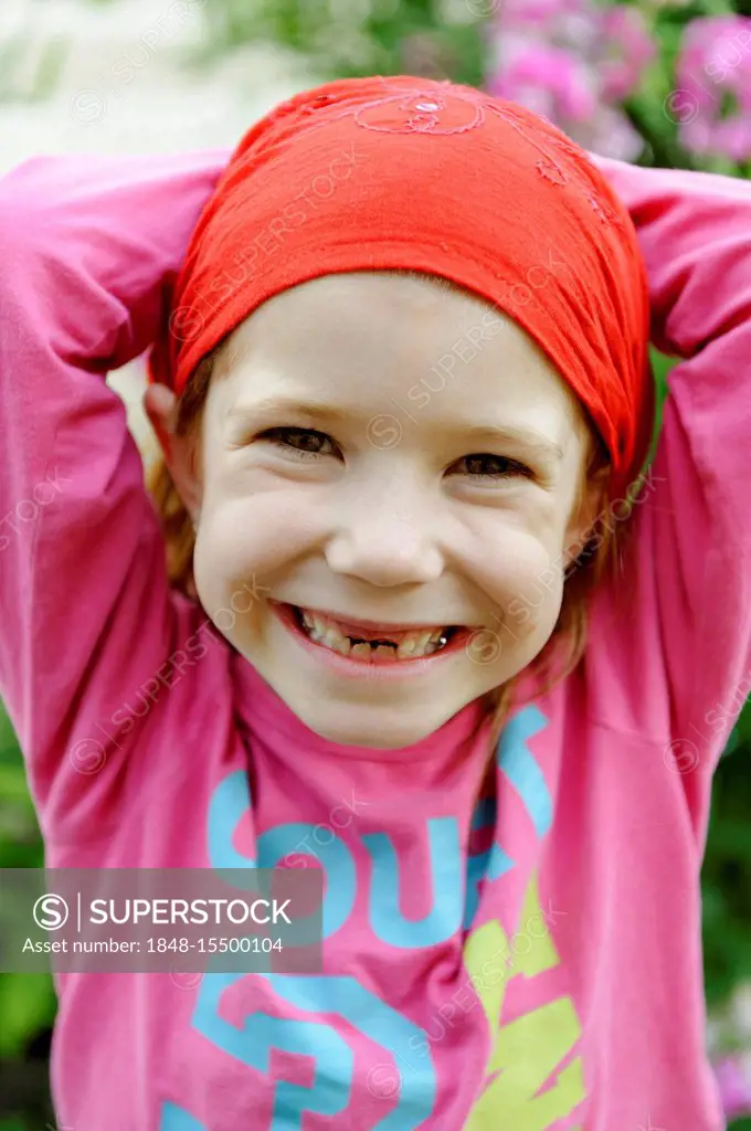 Little girl with a tooth gap, top incisor teeth are missing