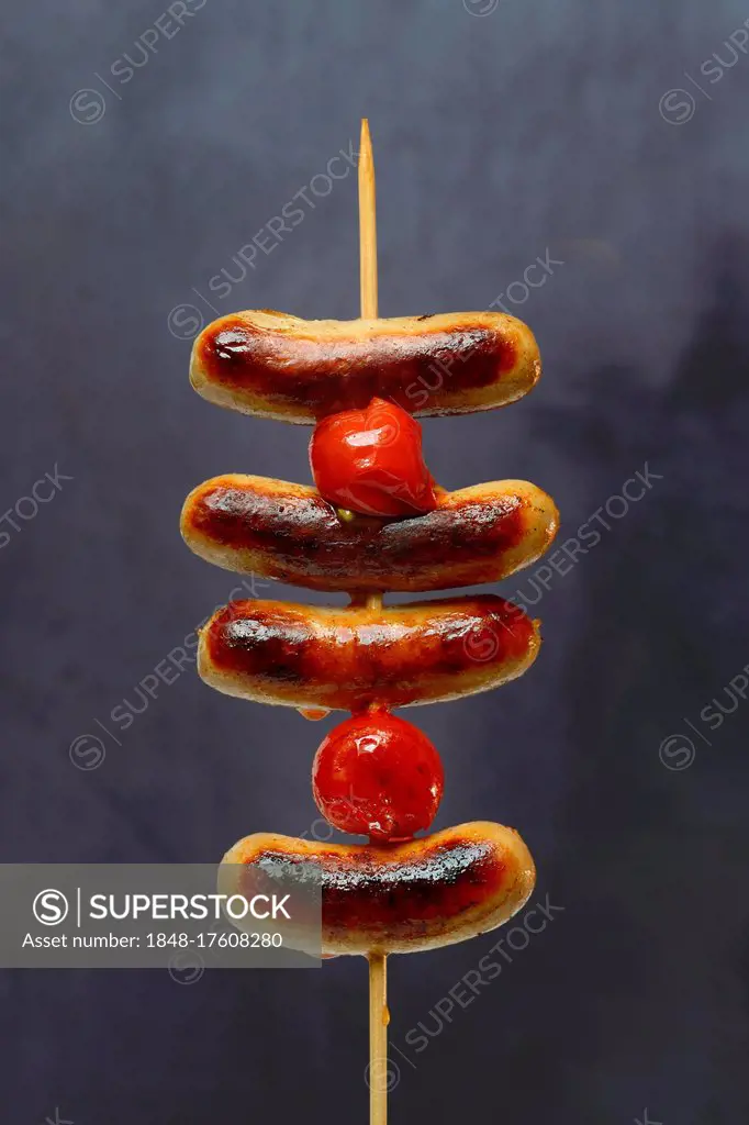 Chipolata sausages on wooden skewers Switzerland