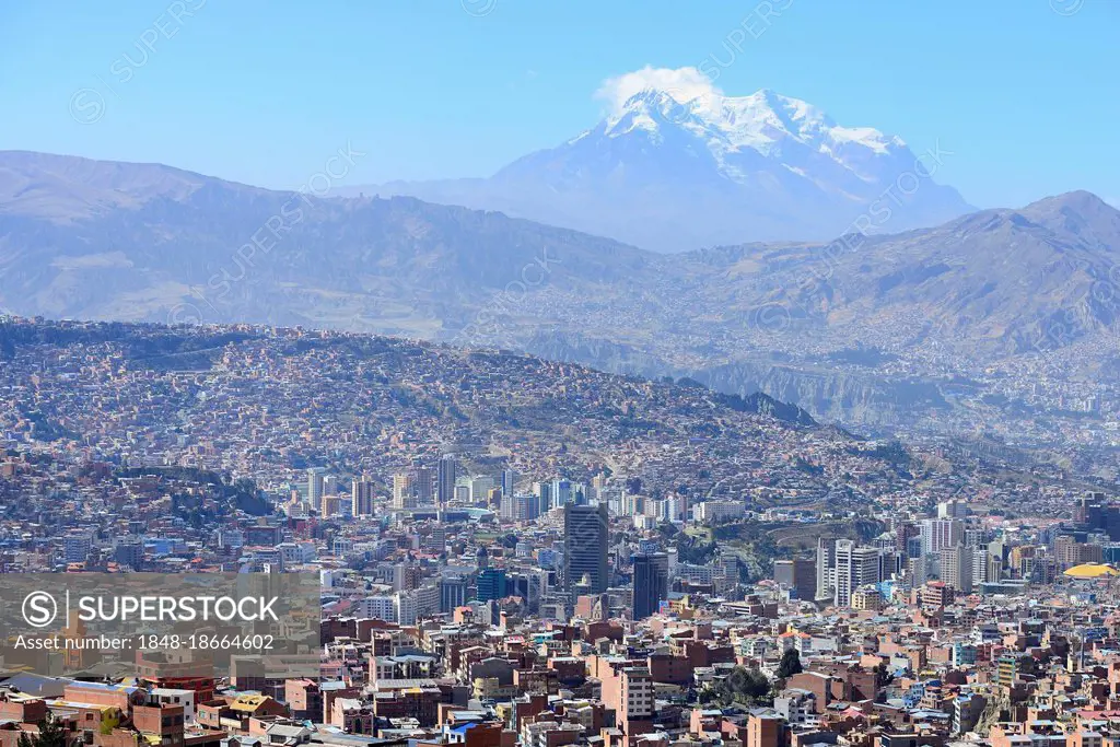 View of the sea of houses in the capital, Cerro Illimani of the Cordillera Real in the background, La Paz, Bolivia, South America