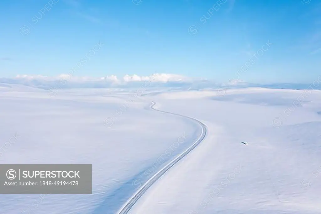 Icy road on plateau, fjell in winter, Batsfjord, Batsfjord, Varanger Peninsula, Finnmark, Northern Norway, Norway, Europe