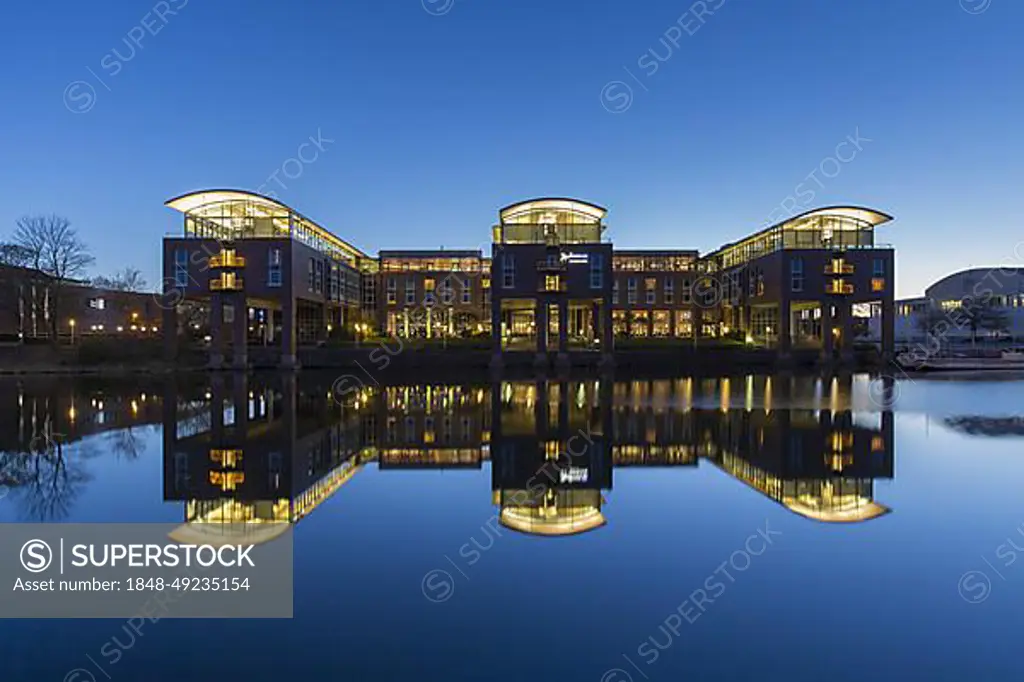 Radisson Blu Senator Hotel along the river Trave at sunset, Hanseatic City of Luebeck, Luebeck, Schleswig-Holstein, Germany, Europe