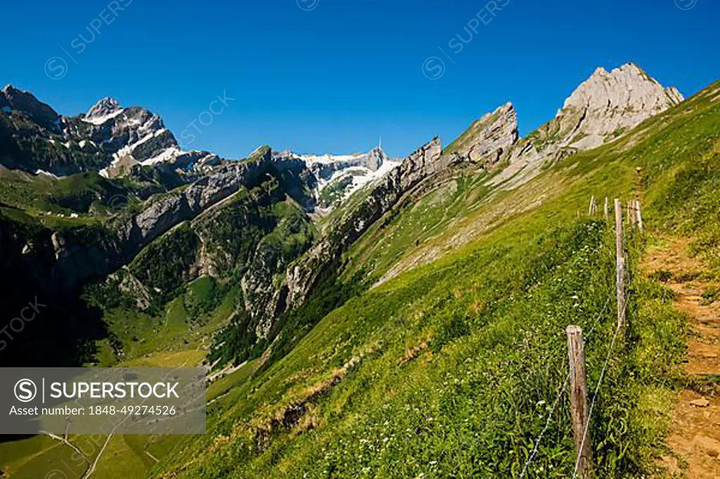 Steep mountains and lake, Seealpsee, Wasserauen, Alpstein, Appenzell Alps, Canton Appenzell Innerrhoden, Switzerland, Europe