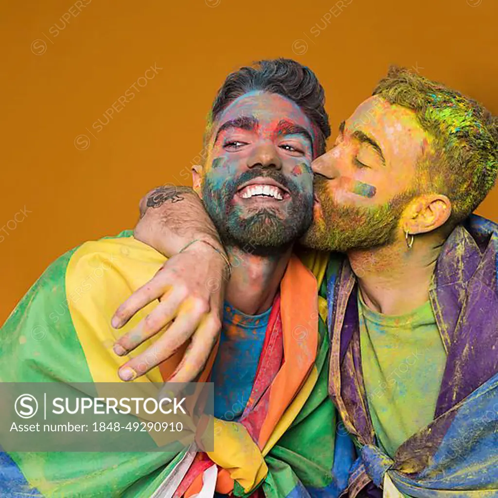 Playful gay couple rainbow colors