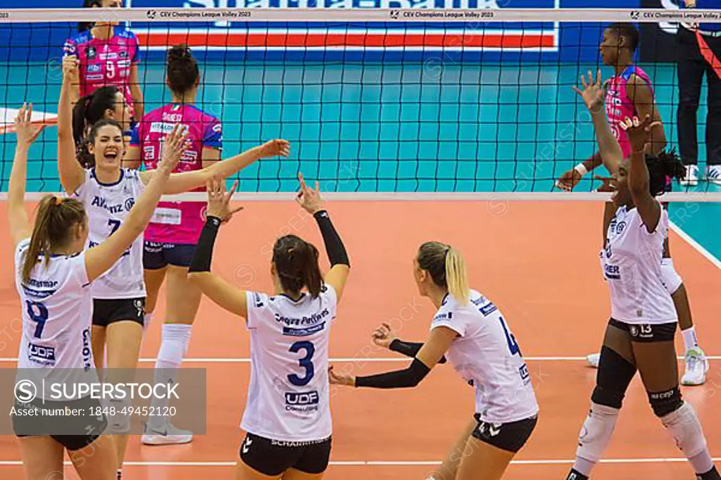 Allianz MTV Stuttgart players cheer after winning a point