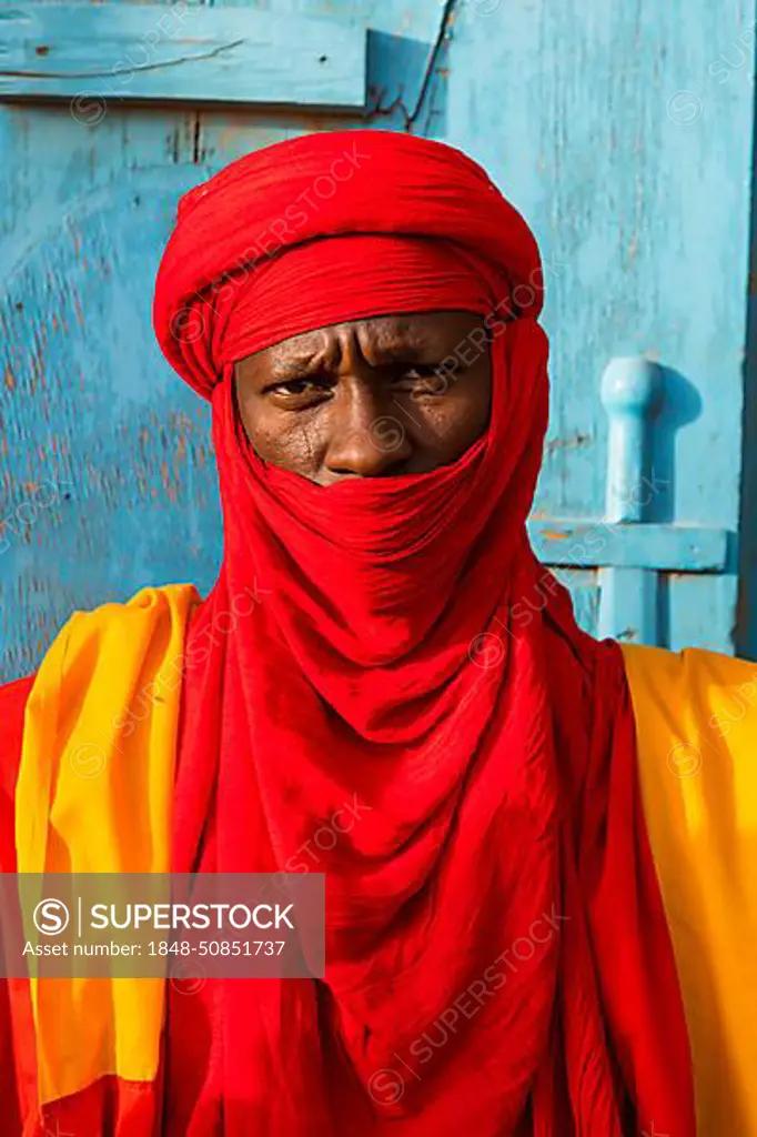 Colourful dressed bodyguard of the sultan of Agadez, Unesco world heritage sight Agadez, Niger, Africa