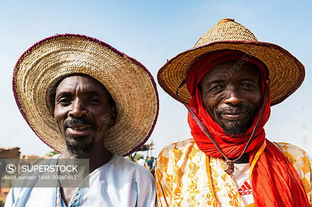 Portrait of two friendly Peul men, Niger, Africa