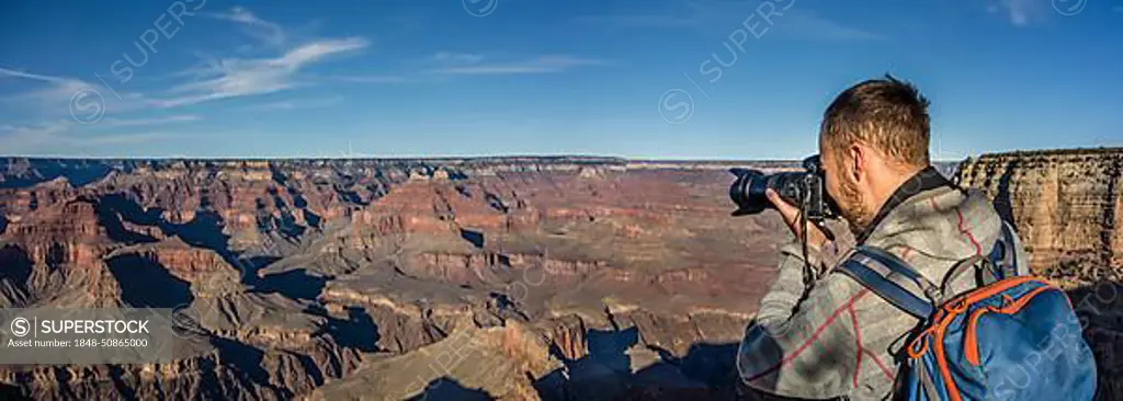 Tourist photographed in Grand Canyon, canyon landscape, eroded rock landscape, South Rim, Grand Canyon, Grand Canyon National Park, Arizona, USA, North America