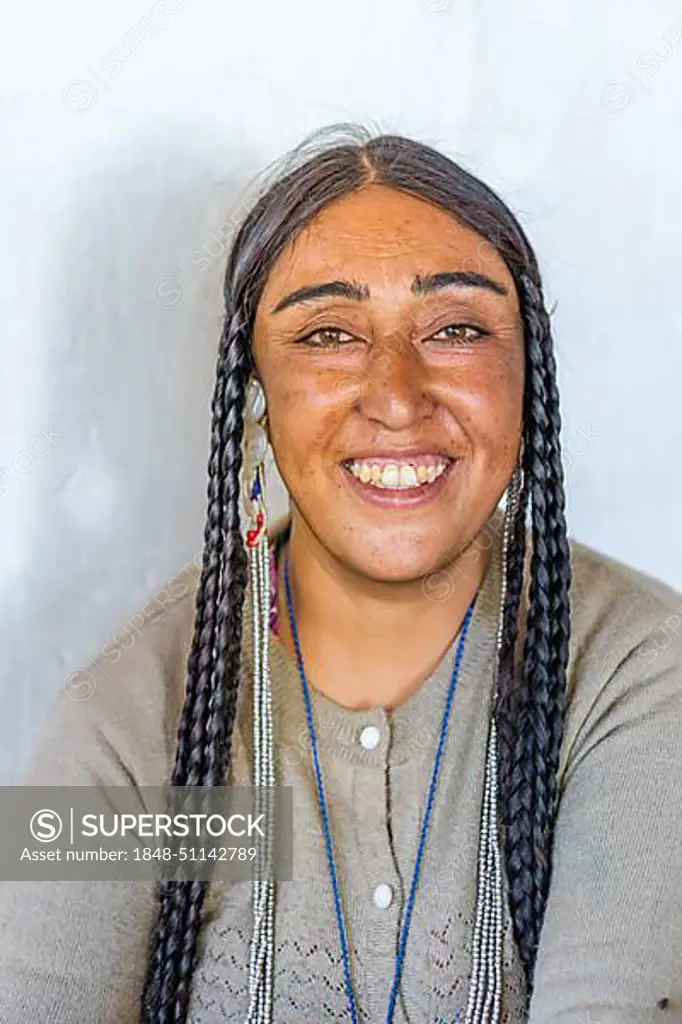 Ladakh, India, August 29, 2018: Portrait of an indigenous smiling young woman in Ladakh, India. Illustrative editorial, Asia