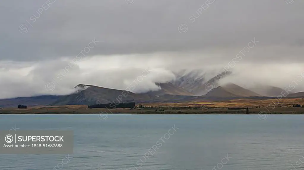 Popular travel destination in New Zealand. Moody sky over Mt Dobson