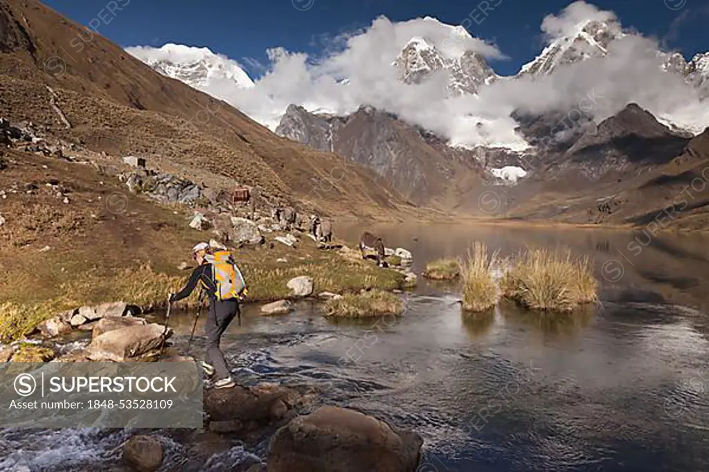 Mountaineer at Laguna Carhuacocha, Cordillera Huayhuash, Peru, South America