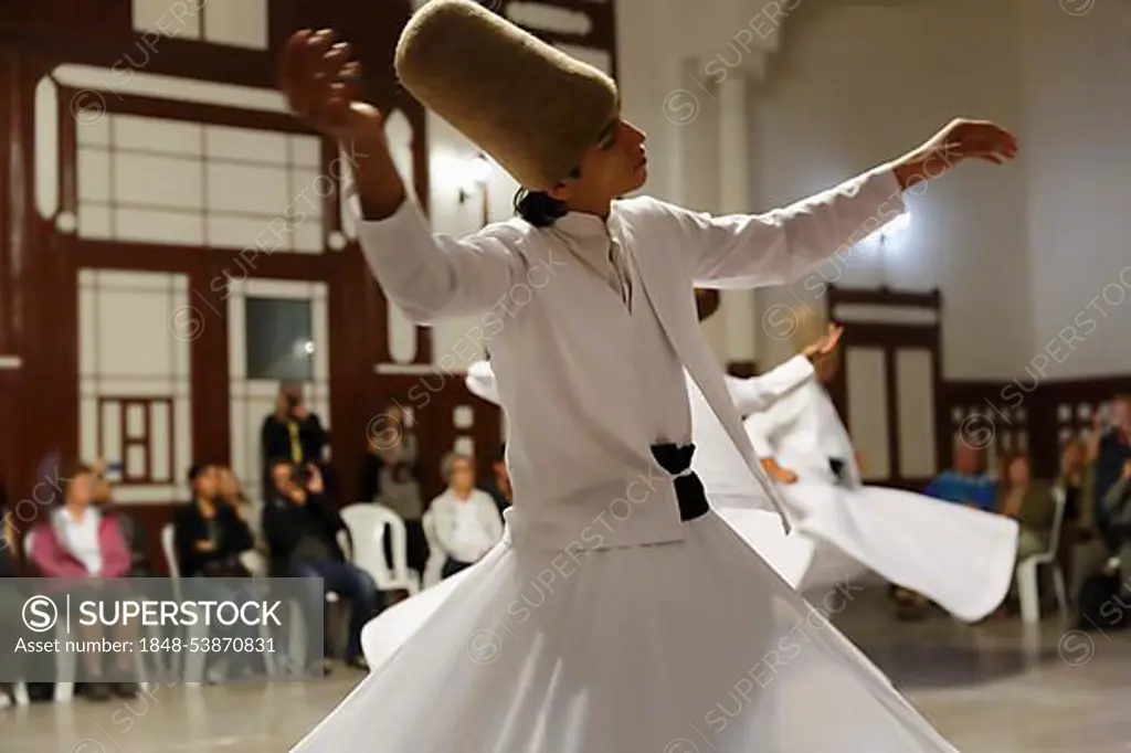 Whirling Dervishes dancing the Sema, a Dervish dance, Sirkeci Railway Station, Istanbul, Turkey, Europe, Istanbul, Istanbul Province, Turkey, Asia