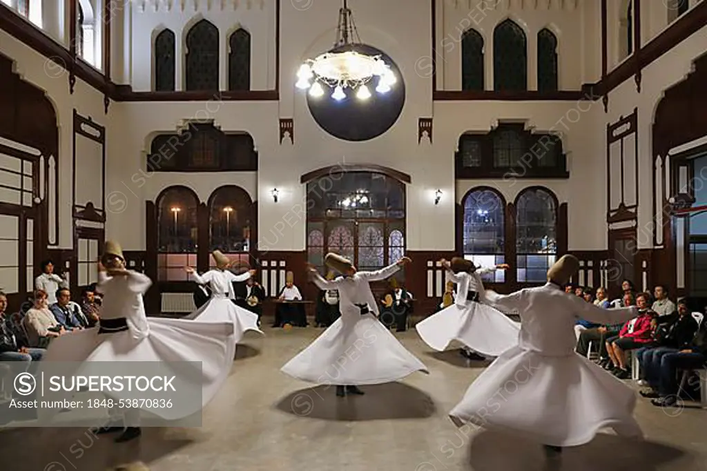 Whirling Dervishes dancing the Sema, a Dervish dance, Sirkeci Railway Station, Istanbul, Turkey, Europe, Istanbul, Istanbul Province, Turkey, Asia