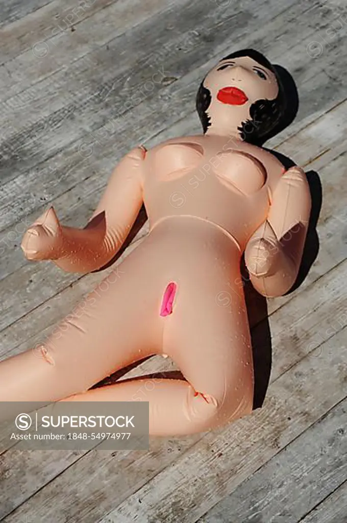 Inflatable sex doll or toy at the stand of DSL 55 in the open air  