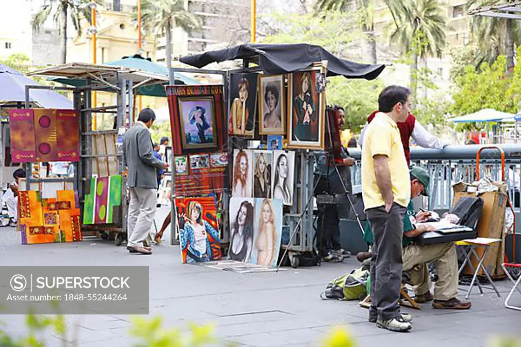 Street sale of paintings, Plaza de Armas, Santiago de Chile, Chile, South America