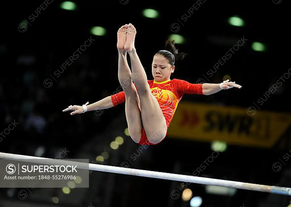 Fei Cheng, China, performing on the asymmetric bars, Gymnastics World Cup Stuttgart 2008, Baden-Wuerttemberg, Germany, Europe