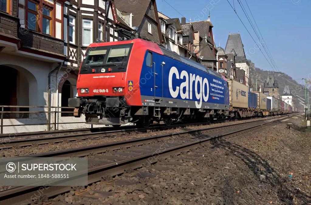 Freight train passing through Bacharach, Upper Middle Rhine Valley, UNESCO World Heritage Site, Rhineland-Palatinate, Germany, Europe