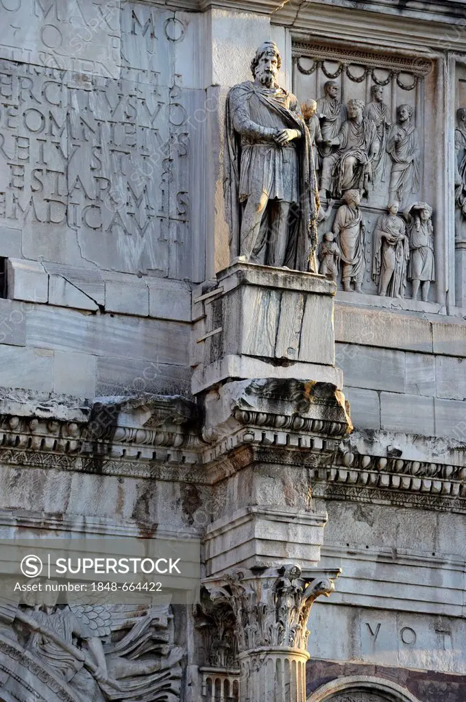 Statue of a Dacian prisoner with attic relief on the Arch of Constantine, Piazza del Colosseo, Rome, Lazio, Italy, Europe