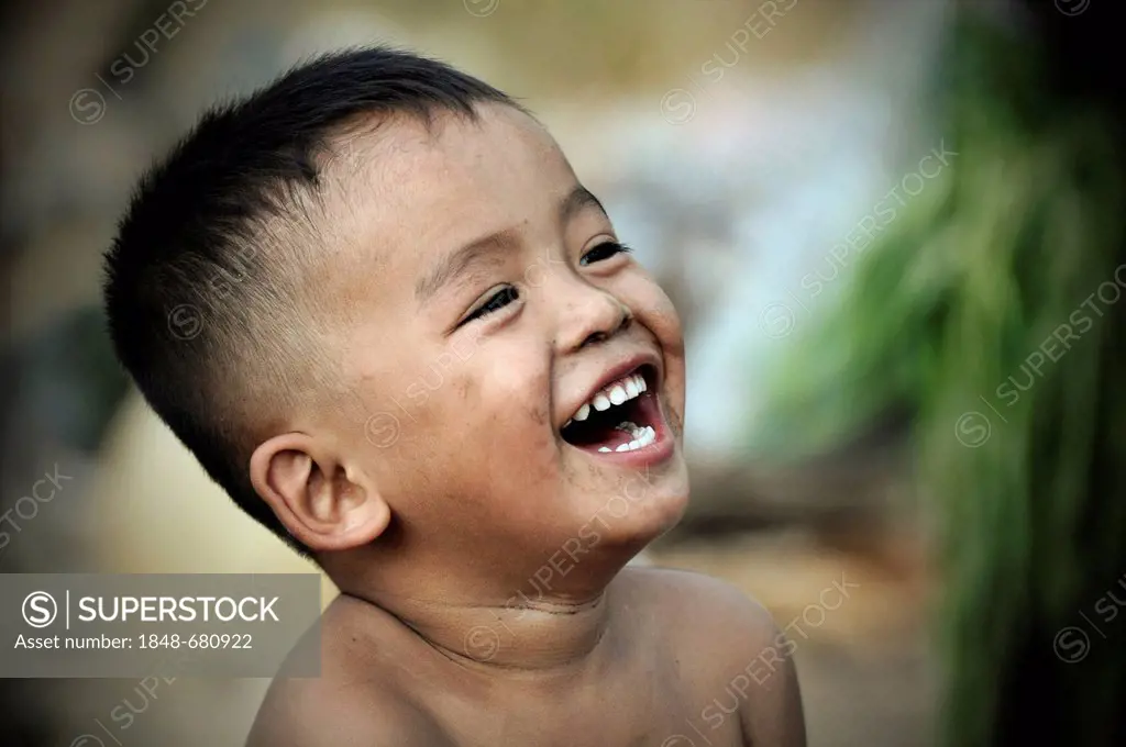 Laughing boy in Cambodia, Southeast Asia, Asia