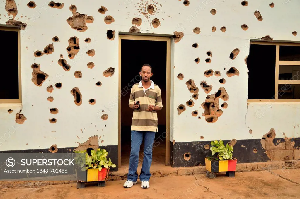 Local leader at the memorial for the Belgian peacekeeping soldiers murdered in April 1994 in Kigali, Rwanda, Africa