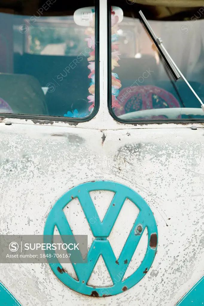 VW camper van, hippie bus, T1, 1960's, original turqouise and white colour, white wall tyres, elevating roof and inscription Hotel California