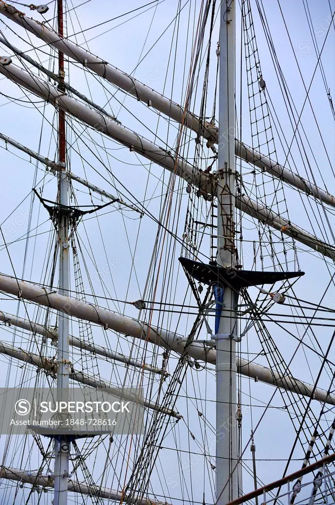 Detail view of the rigging of the school ship Gorch Fock at anchor in gloomy weather, harbour of Stralsund, Mecklenburg-Western Pomerania, Germany, Eu...