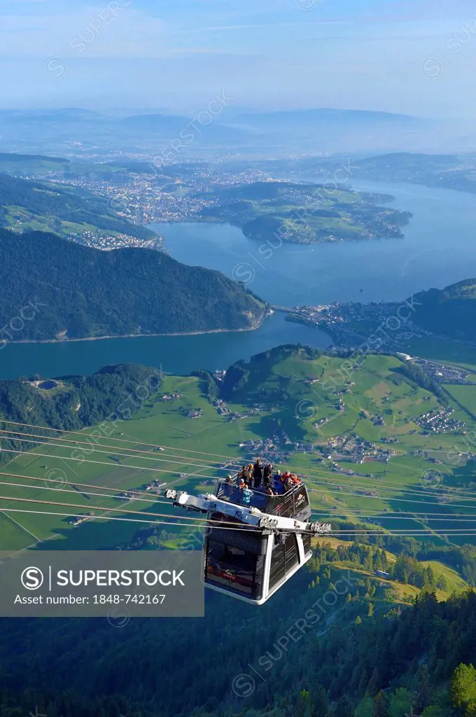 CabriO Bahn, the world's first cable car with an open top deck, going up Stanserhorn Mountain, Stans, Switzerland, Europe